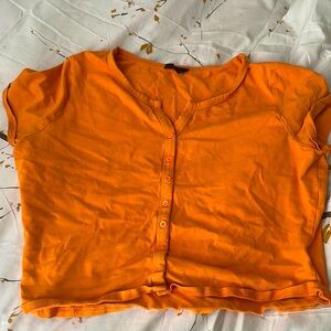 Orange buttoned crop top